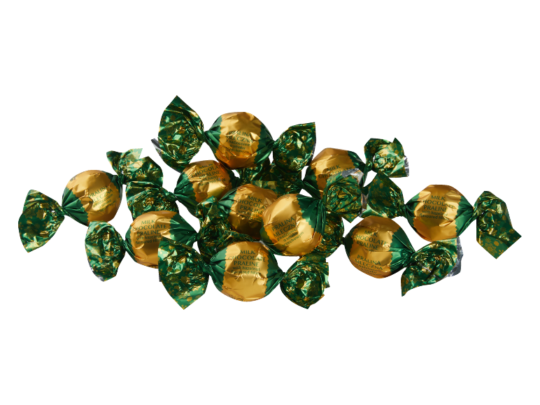 Mliječne čokoladne praline s lješnjakovim punjenjem, umotane u zelenu i zlatnu foliju.