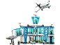 Set za izgradnju zračne luke s avionom, kontrolnim tornjem i figurama.