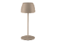 Bež stolna lampa sa sjenilom u obliku kupole i okruglim postoljem.