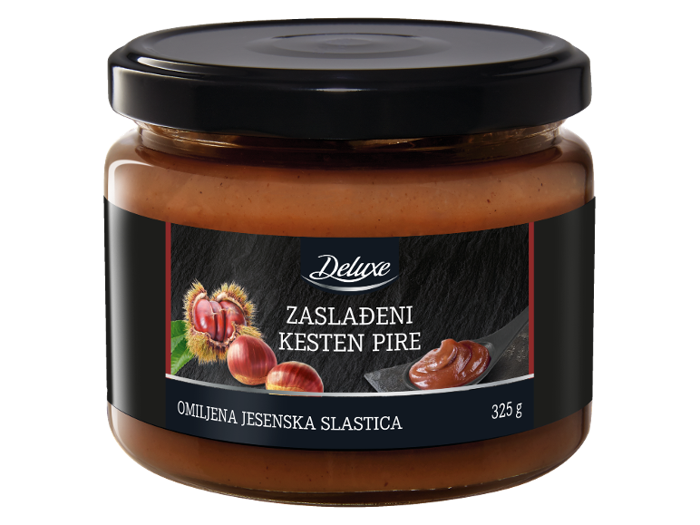 Teglica zaslađenog kesten pirea s kestenima i žlicom pirea