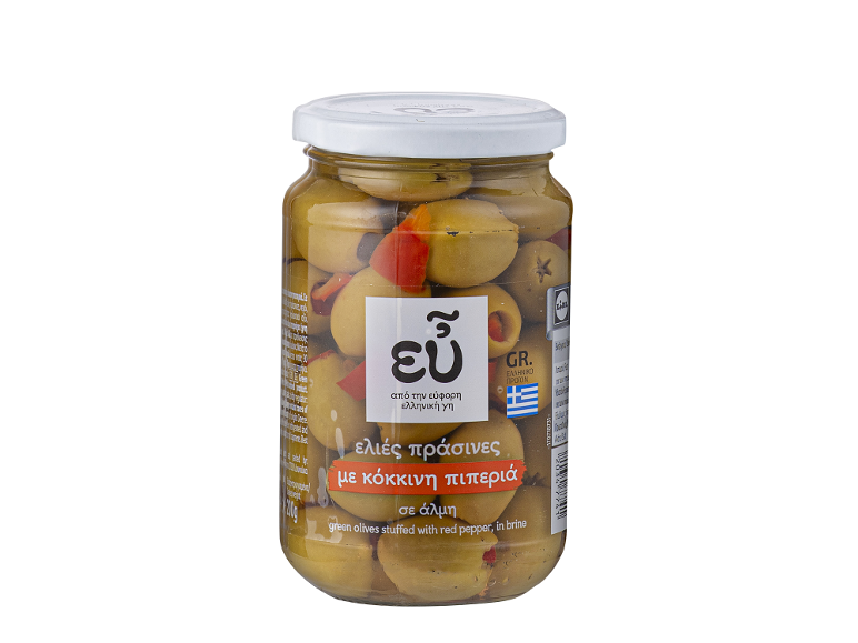Staklenka zelenih maslina punjenih crvenom paprikom, u salamuri.