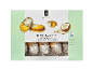 Kutija kokosovih petit four kolačića s punjenjem od marelice, neto težina 330g.