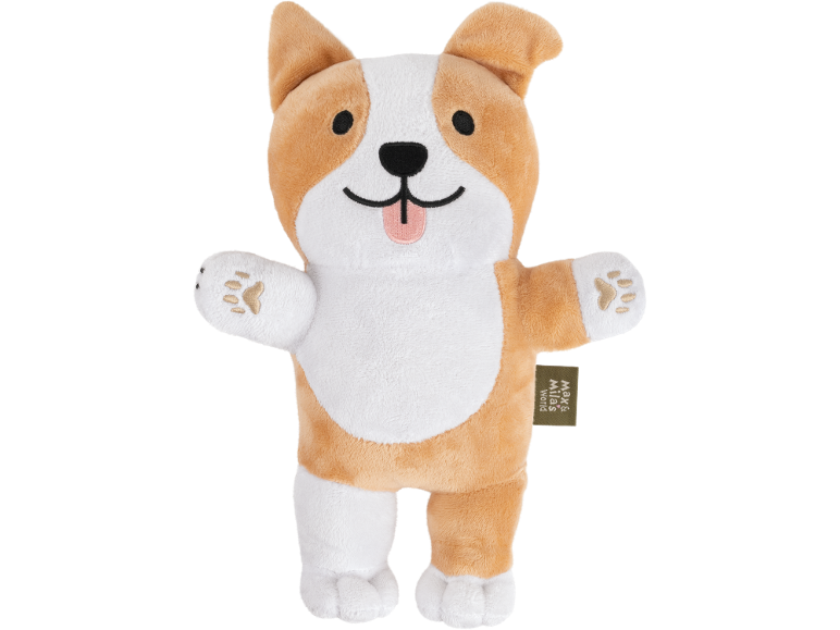 Plišana igračka psa corgija s isplaženim jezikom i izvezenim šapama, sa zelenom etiketom.