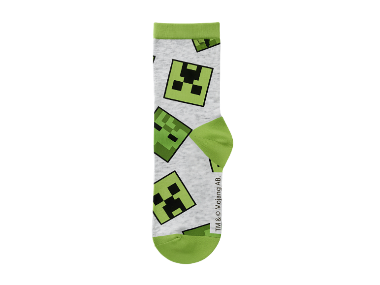 Bijela čarapa s uzorkom lica Creeper-a iz Minecrafta i zelenim detaljima.