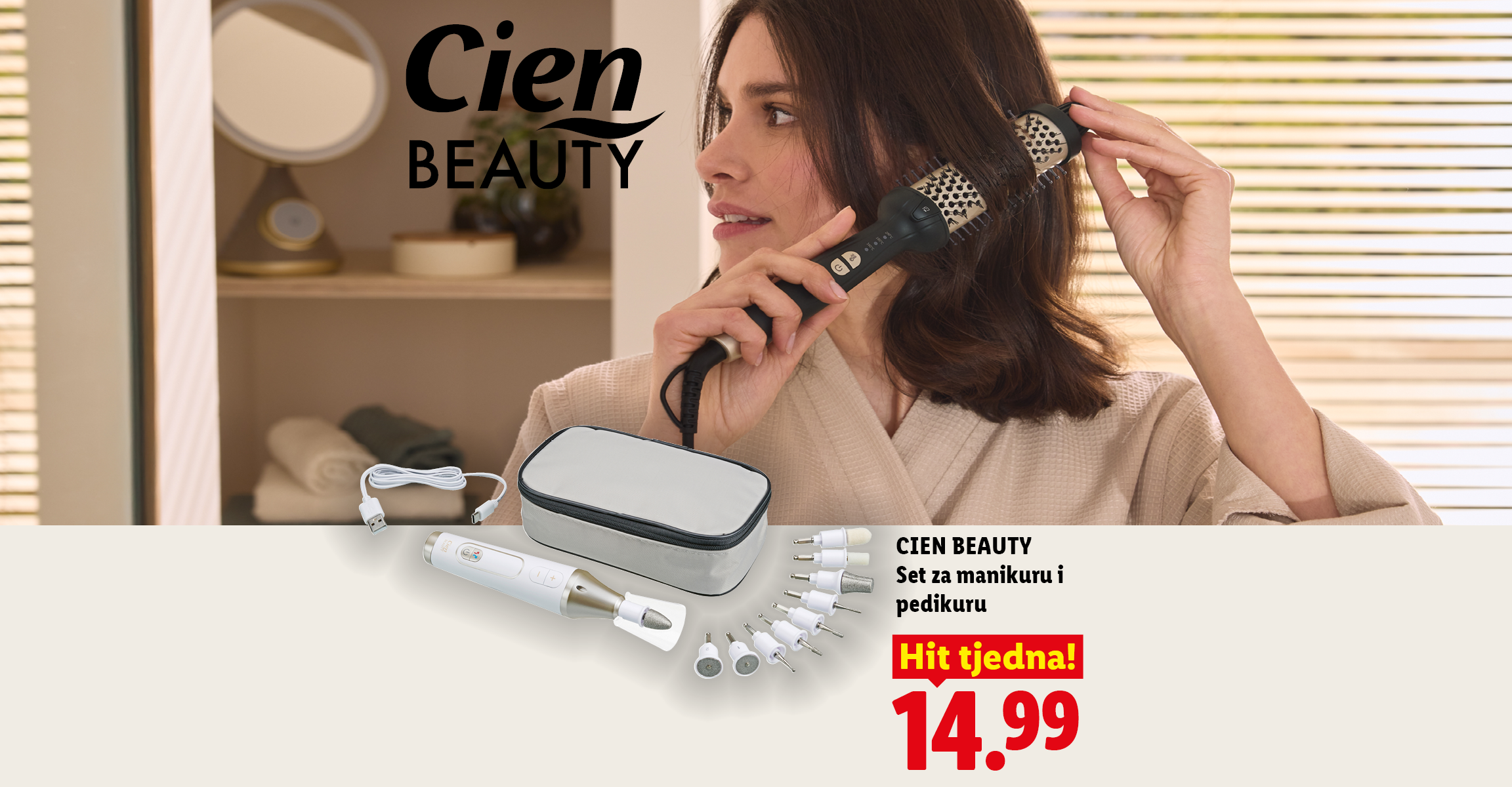 Žena koristi četku za sušenje kose, a pored je set za manikuru i pedikuru za 14,99.