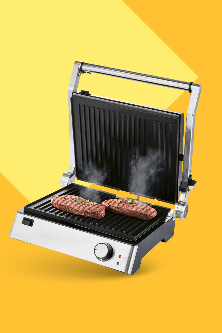 Električni roštilj s dva odreska na žaru i parom, na žutoj pozadini.