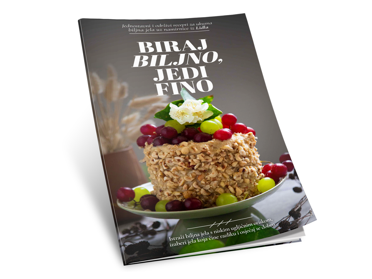 Kuharica 'Biraj biljno, jedi fino' s receptima za biljna jela iz Lidla, ukrašena tortom.