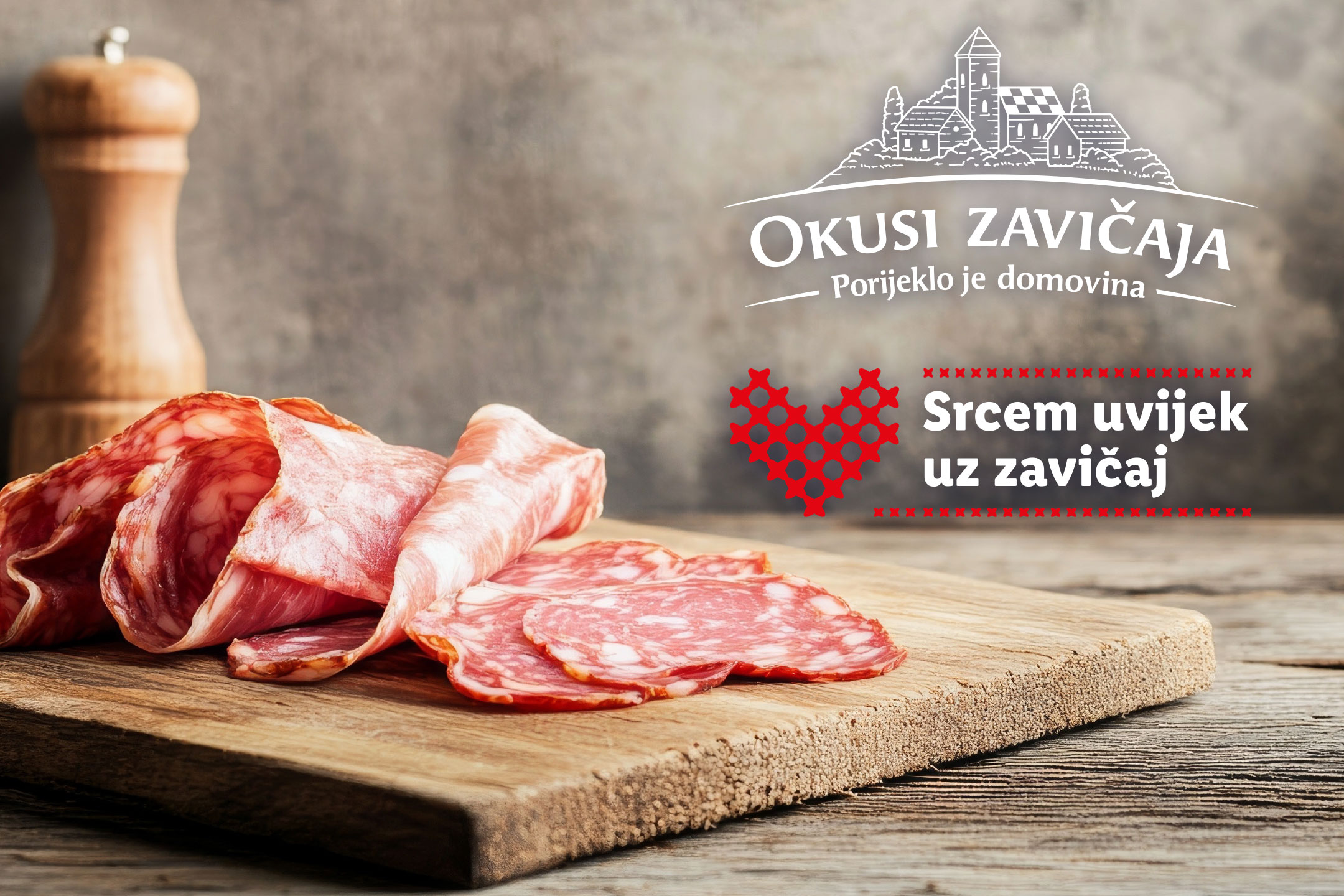 Narezana salama na drvenoj dasci s logom Okusi zavičaja i natpisom 'Srcem uvijek uz zavičaj'.